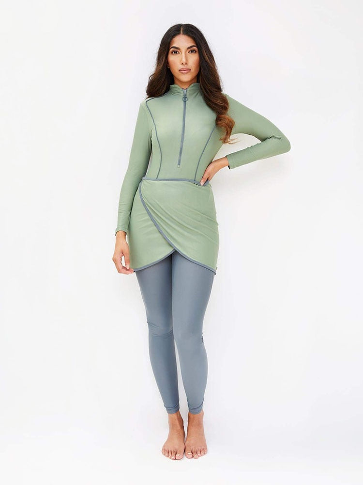 Upgrade your swimwear game with our Modest Long Sleeve Burkini Swimwear for Women, including a hijab for added coverage. Dive into fashion and faith together!