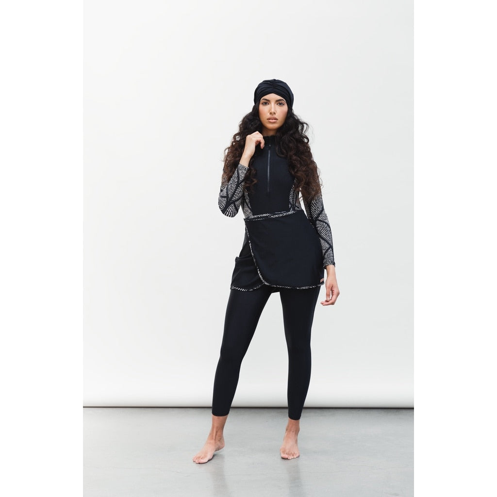 Upgrade your swimwear game with our Modest Long Sleeve Burkini Swimwear for Women, including a hijab for added coverage. Dive into fashion and faith together!